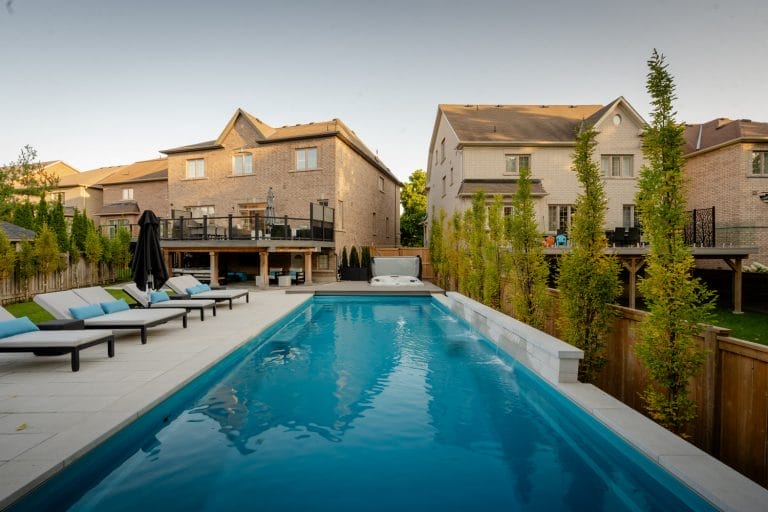 82 Rumsey Rd, Toronto, landscaping project featuring pool building, deck installation and patio building