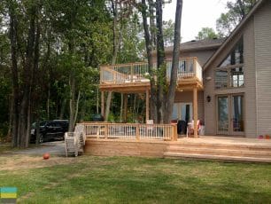 Two level cedar deck, aluminum railings with cedar posts