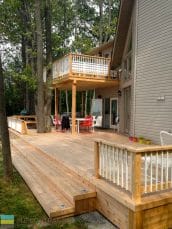 Two level cedar deck with aluminum railings and cedar posts