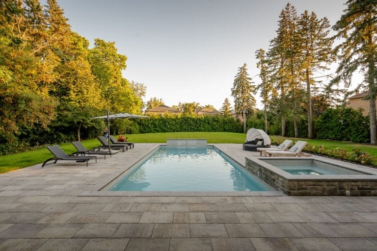 Backyard Landscaping Project at Oxford Rd features pool and patio construction