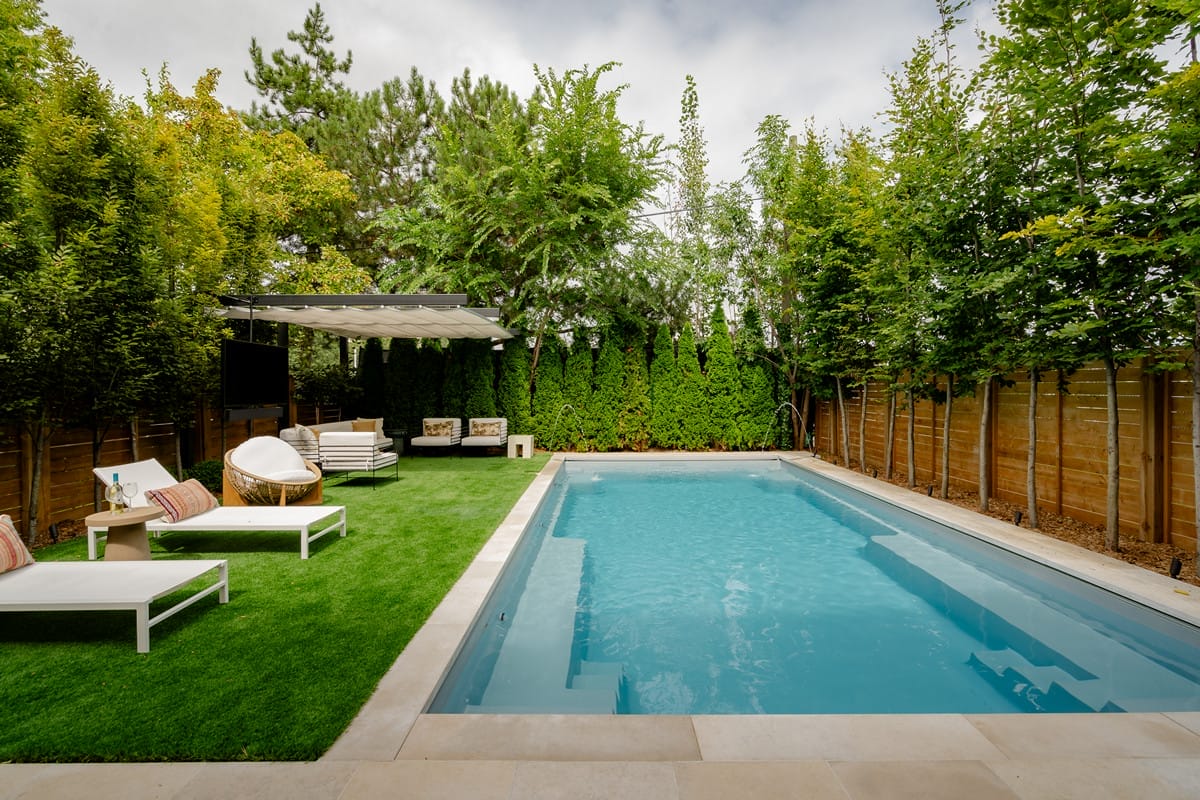 12 Baycrest Road in Toronto, this landscaping project highlights a beautifully designed pool, accented by a flagstone patio