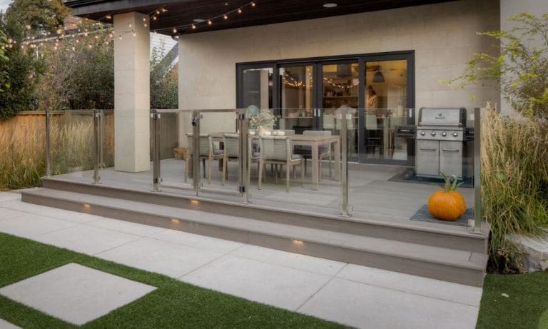 Landscaping Project at Rathburn Road, Etobicoke featuring composite deck over sandstone pavers