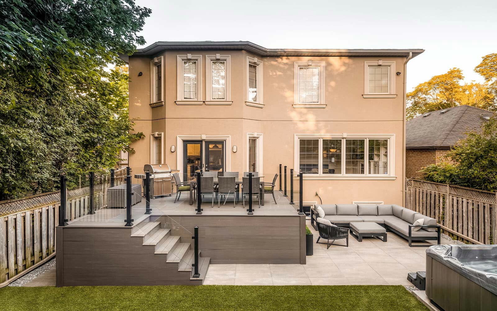 AZEK Decking Project Toronto; Featuring Patio Design, Interlocking, Privacy Fence & Aluminum Glass Railings by Toronto Landscaping Company.