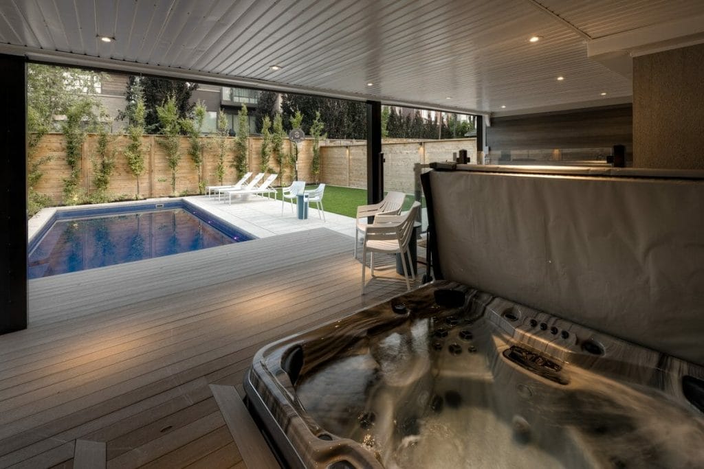 Backyard Landscape Design Project, Featuring Swim Spa & PVC Deck, Fiberglass Pool Installation, and Interlocking