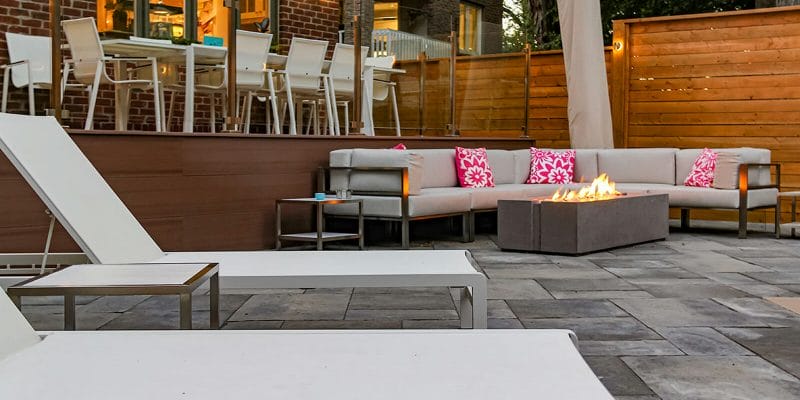 Toronto Backyard Landscaping Design Project; Featuring Outdoor Fireplace, Interlocking & Azek Deck Build with Stainless Steel Glass Railing by M.E. contracting