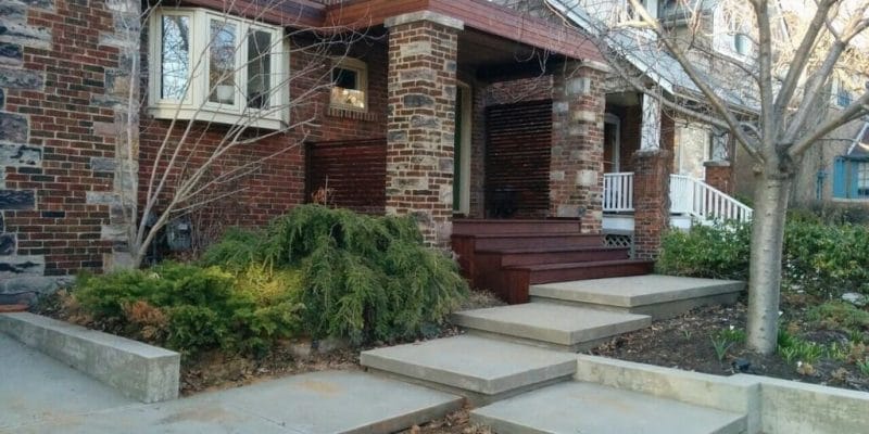 Landscaping Project featuring IPE stairs, stone walkway, steps and horizontal privacy screen by M.E contracting