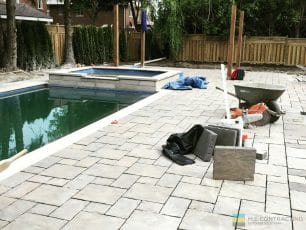 pool construction project with pool side landscaping by M.E. contracting