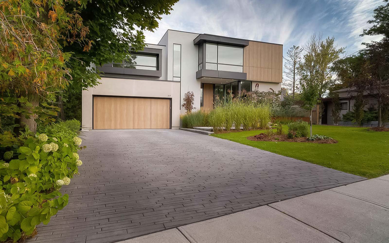 Showcasing front porch Modern Landscaping Design and Construction at Richs, residence Toronto