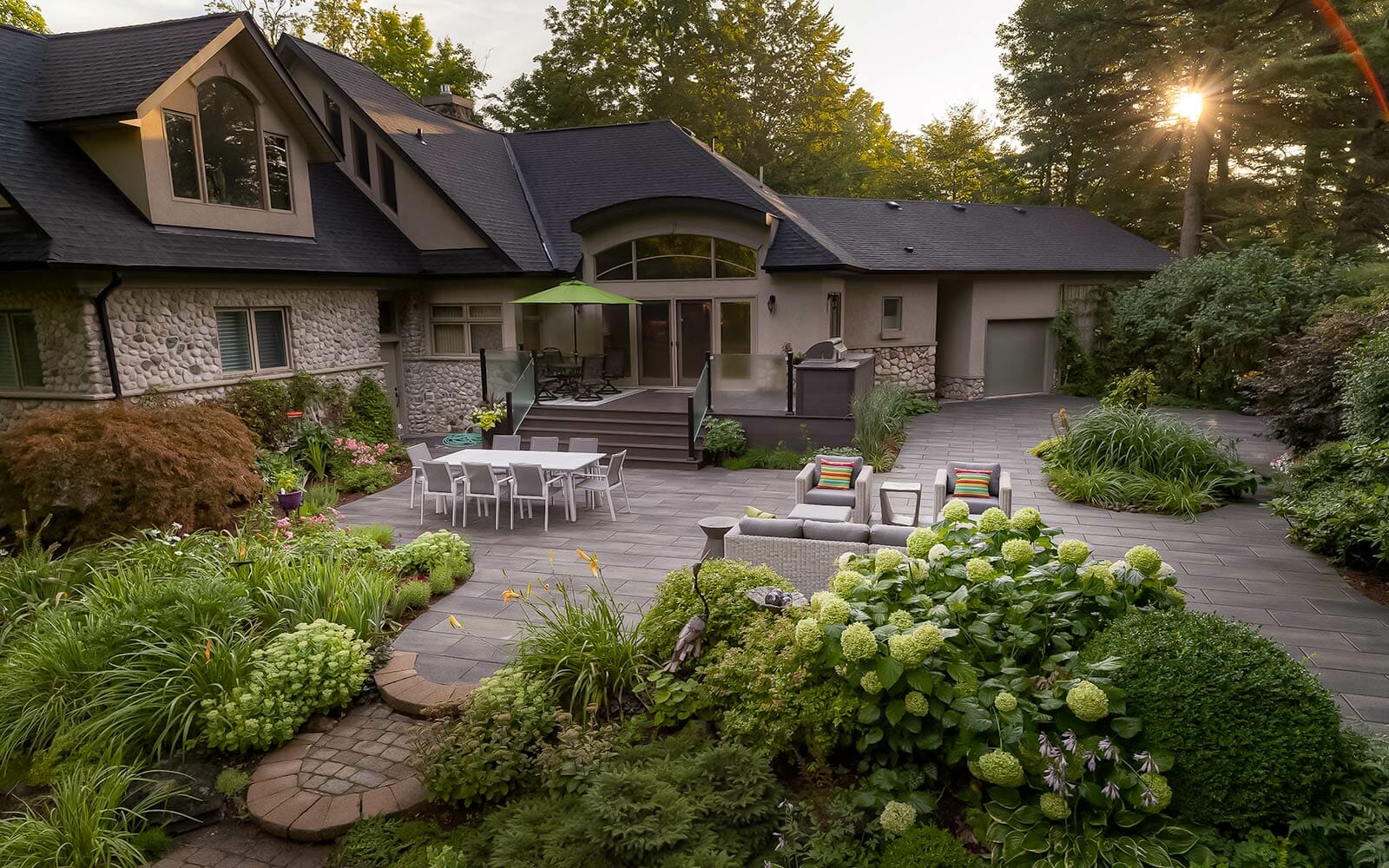 Toronto, Chine Drive backyard; Featuring Patio Design, Interlocking, Composite Decking with Aluminum & Glass Railings build by M.E. contracting