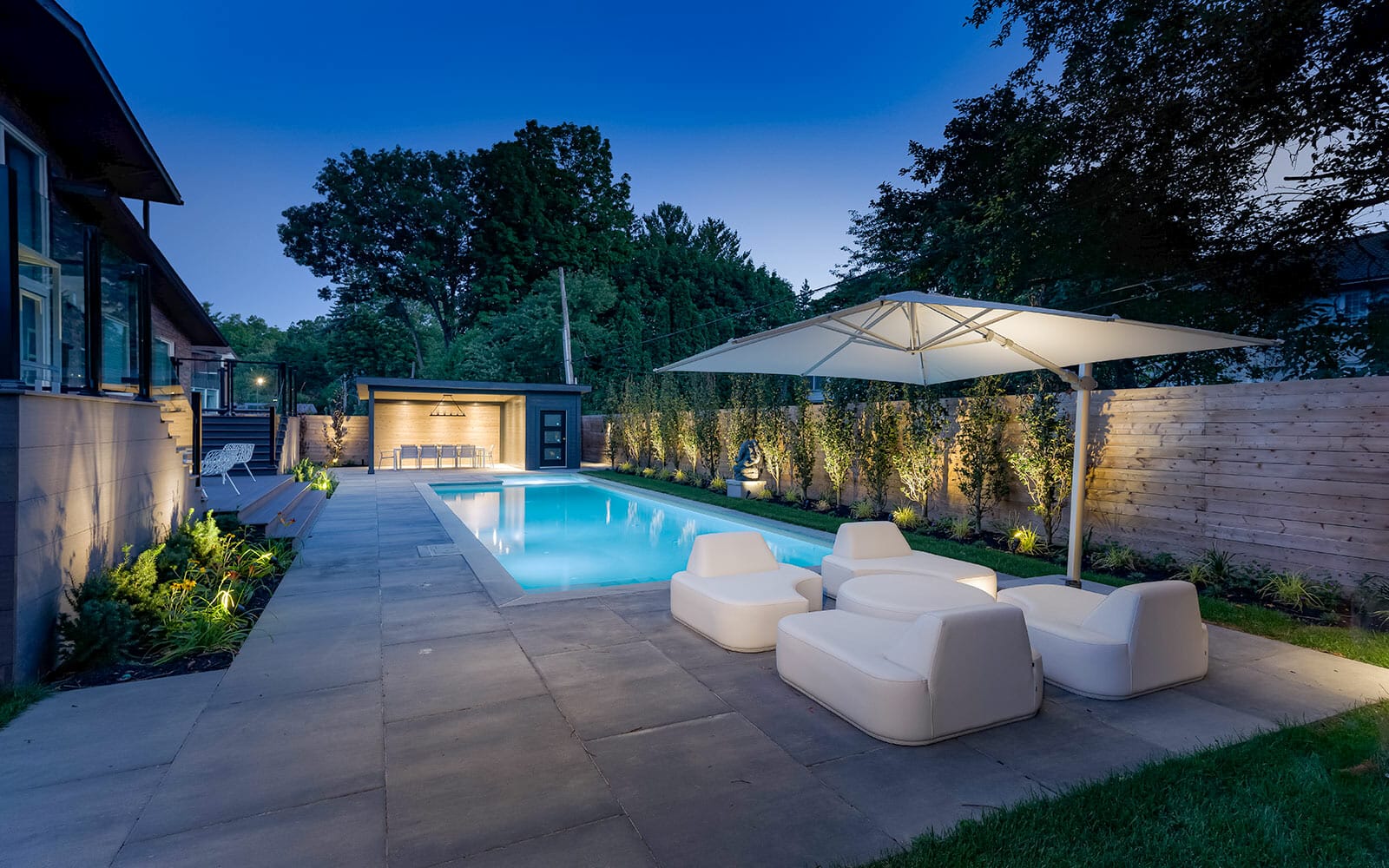 Toronto Landscaping Company Delivers Complete Landscape Design: Concrete Pool construction, Interlocking, Gazebo, PVC Decking, and Privacy Fence