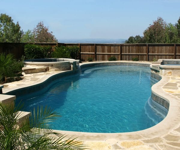 Caribbean Fiberglass pool with side pools by Leisure Pools