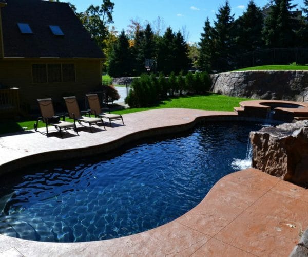 Carribean Fibreglass Pool with coping and side pool by Leisure Pools