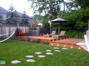 IPE deck, hot tub, lighting, landscaping, outdoor furniture, flagstone interlocking